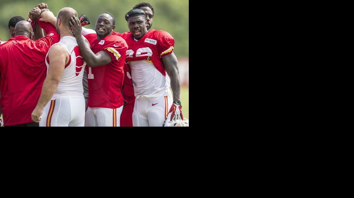 
Kansas City Chiefs running back De’Anthony Thomas (third from right) gathered with the running backs at the end of practice Wednesday morning.


