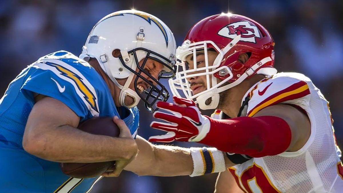 Kansas City Chiefs inside linebacker Josh Mauga (right) sacked San Diego Chargers quarterback Philip Rivers during their game in November. The Chiefs won 33-3.