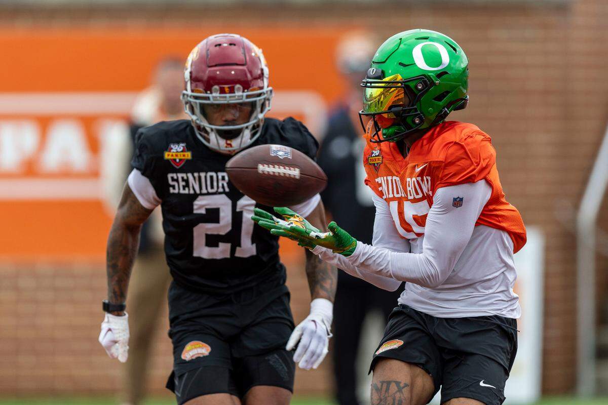 National team wide receiver Tez Johnson of Oregon (15) grabs a pass during Senior Bowl practice for the National team on Jan. 30, 2025 at Hancock Whitney Stadium in Mobile, Alabama.