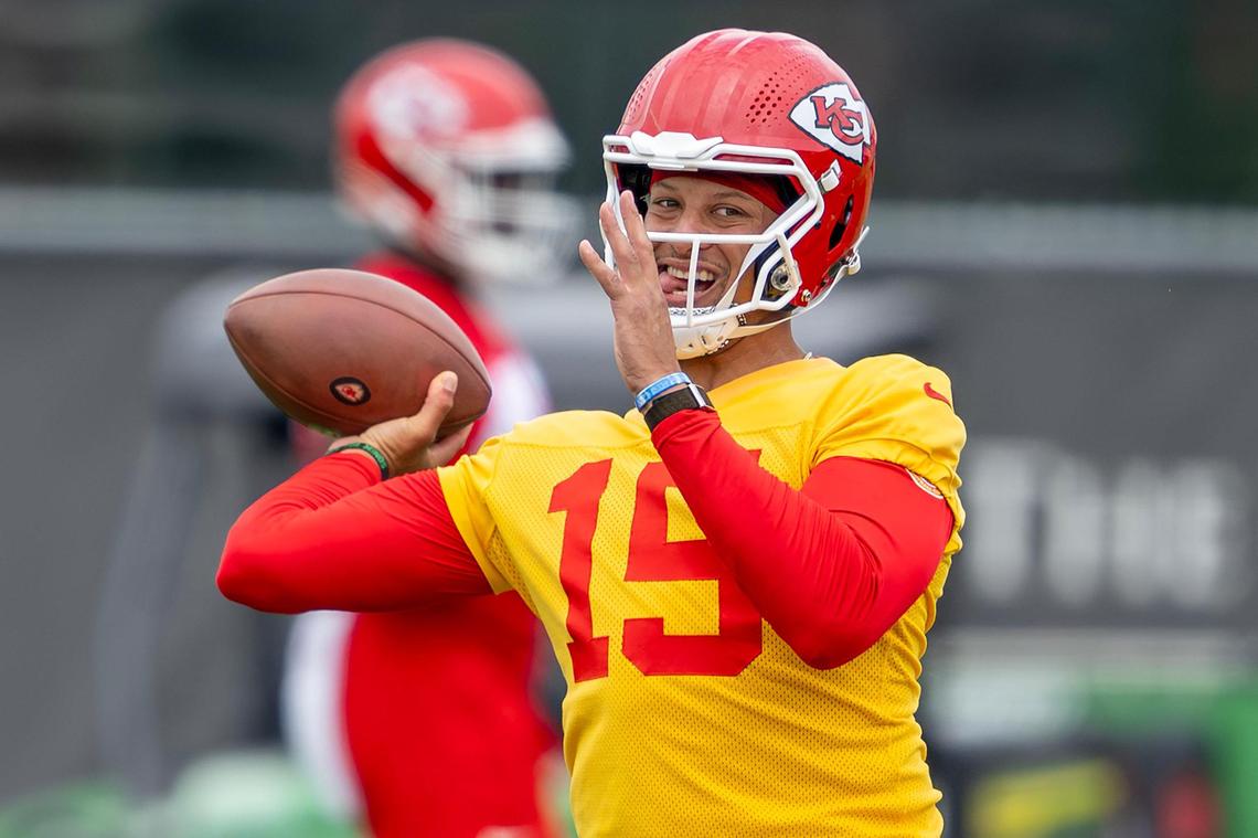 Kansas City Chiefs quarterback Patrick Mahomes (15) throws the ball during a warm-up drill at minicamp on Wednesday, June 18, 2025, at the team’s training facility in Kansas City.