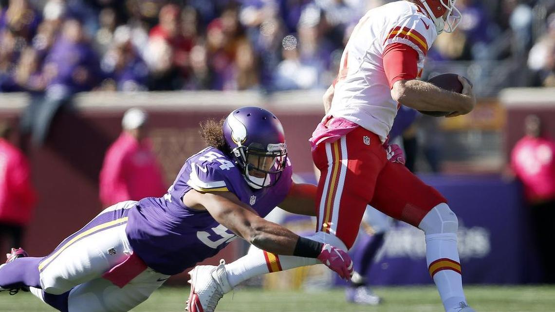 Eric Kendricks (54) tackles Chiefs quarterback Alex Smith (11) in the first quarter at TCF Bank Stadium in Minneapolis on Sunday. The Vikings won 16-10. (Oct. 18, 2015)