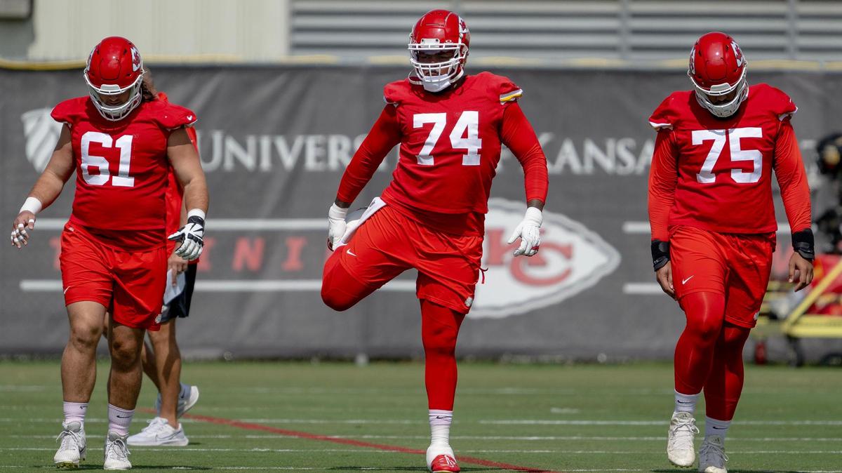 Kansas City Chiefs offensive tackle Jawaan Taylor (74) stretches during a team practice on Tuesday, Sept. 5, 2023, in Kansas City.