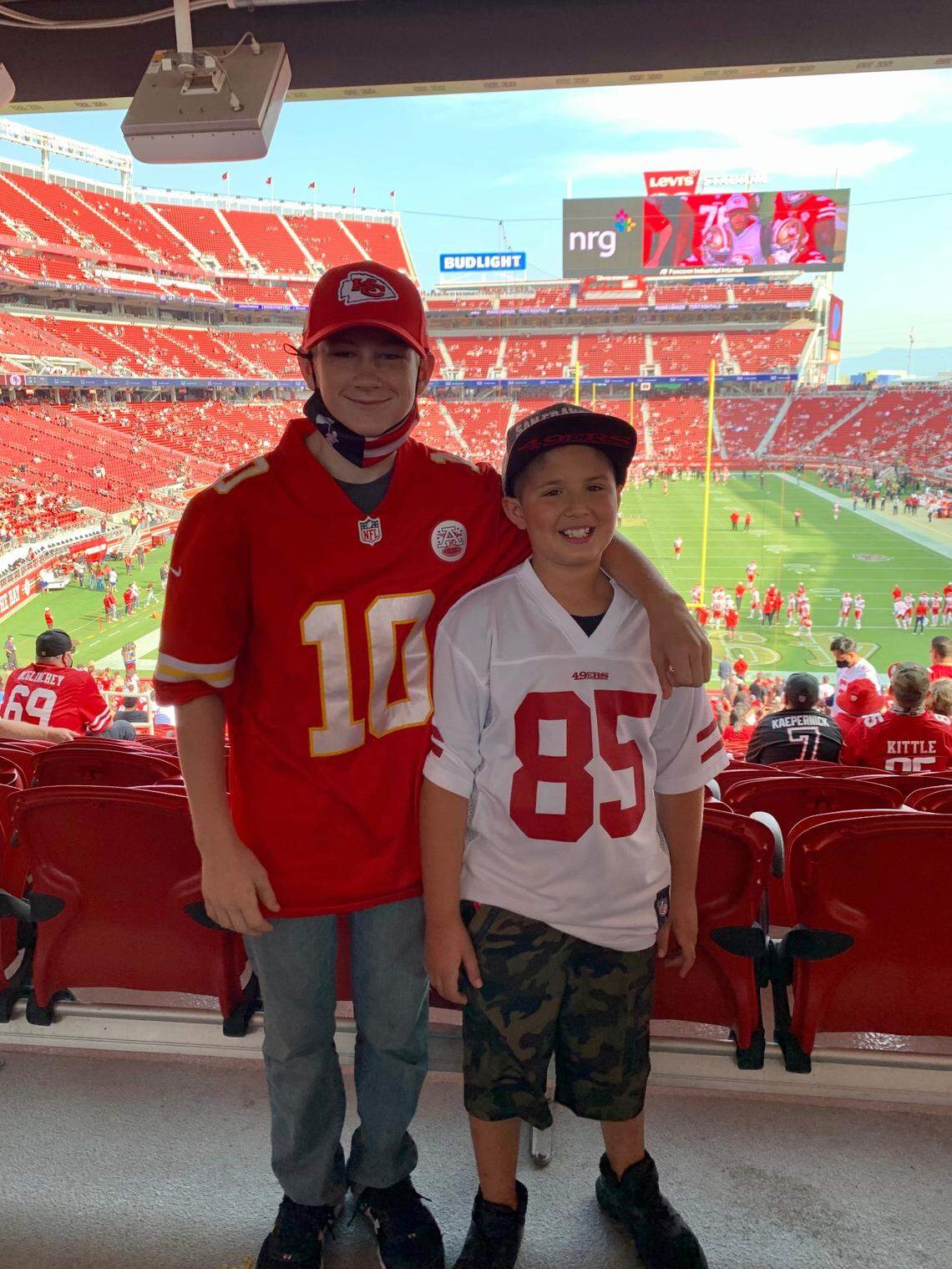 Logan Briscese, right, poses for a photo with a friend at the Kansas City Chiefs-San Francisco 49ers preseason game on Aug. 14, 2021, at Levi’s Stadium in Santa Clara, California.