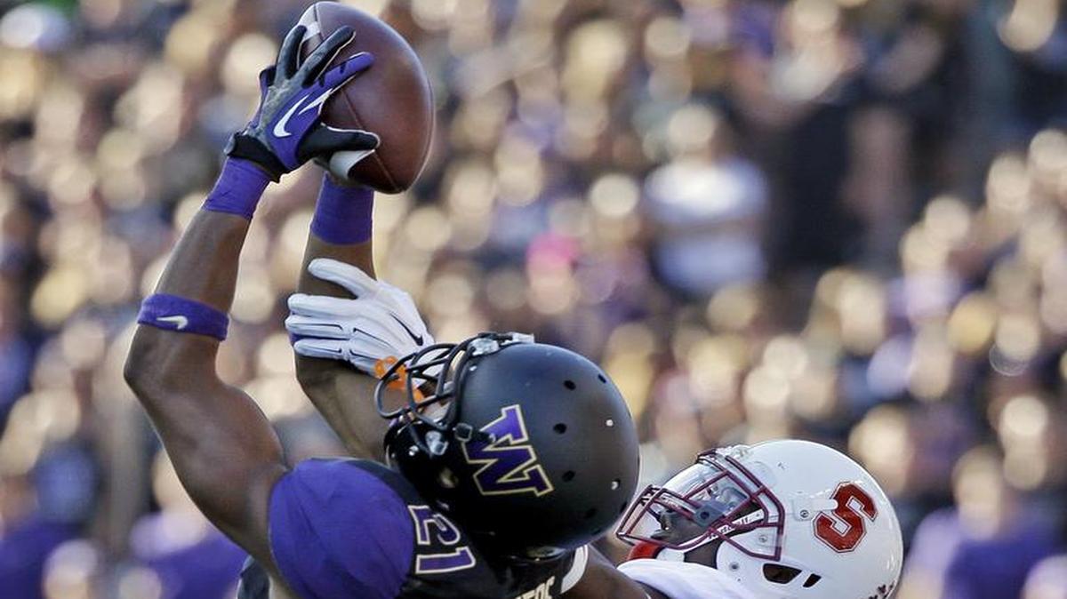 
ESPN analysts agreed that the Chiefs got a highly valued draft pick in Washington's Marcus Peters (left).
