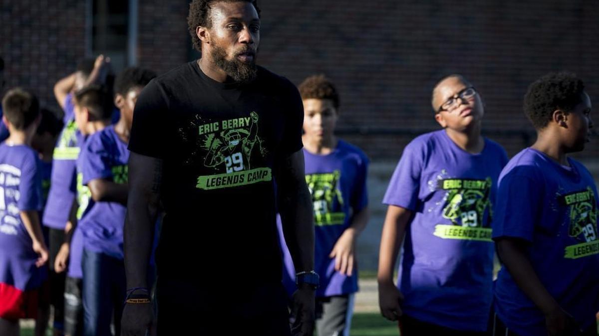 Eric Berry watched youths attending his annual football camp Friday at North Kansas City High School.