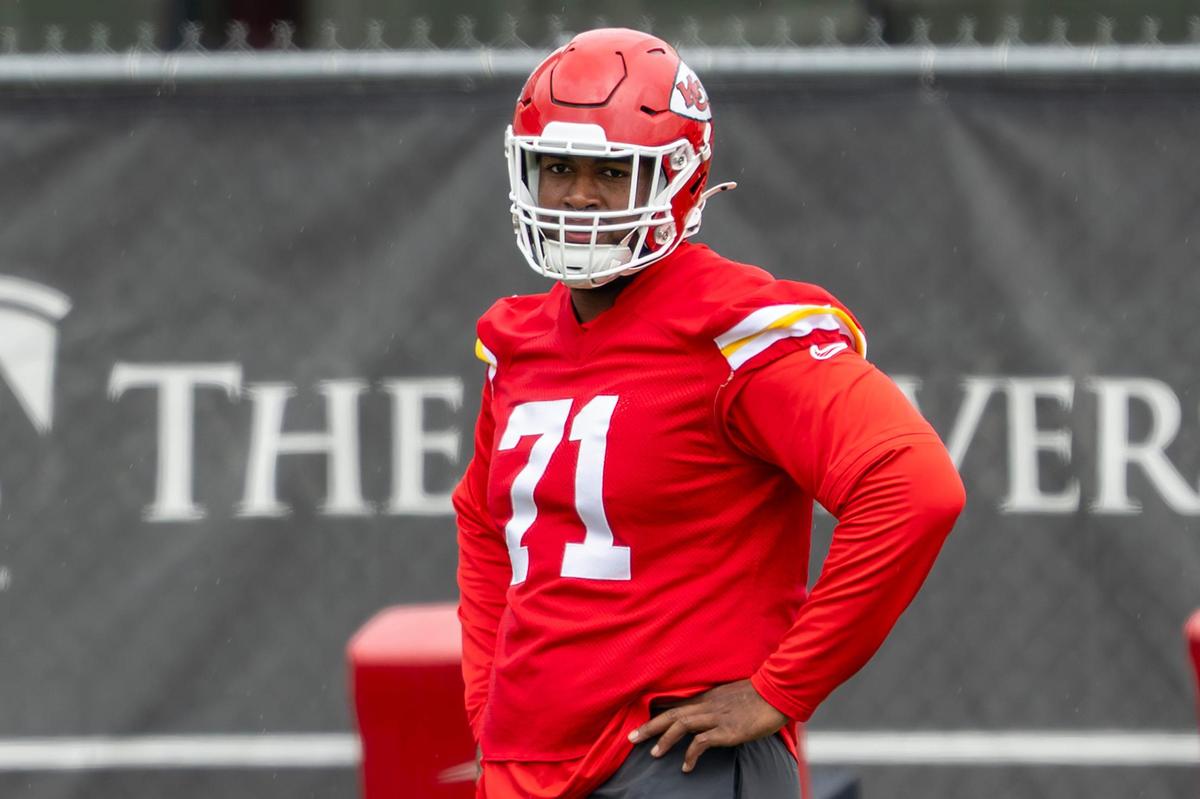 Kansas City Chiefs rookie offensive lineman Josh Simmons (71) participates in stretching exercises during practice at Chiefs’ training facility on Thursday, May 29, 2025, in Kansas City.