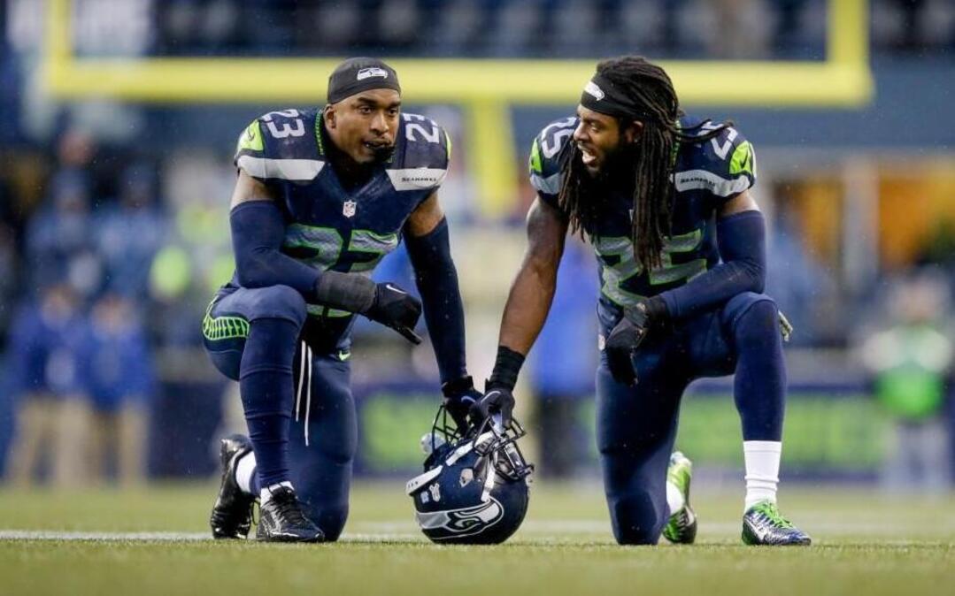 While with the Seahawks in 2014, Jeron Johnson and cornerback Richard Sherman chatted during a game in Seattle.