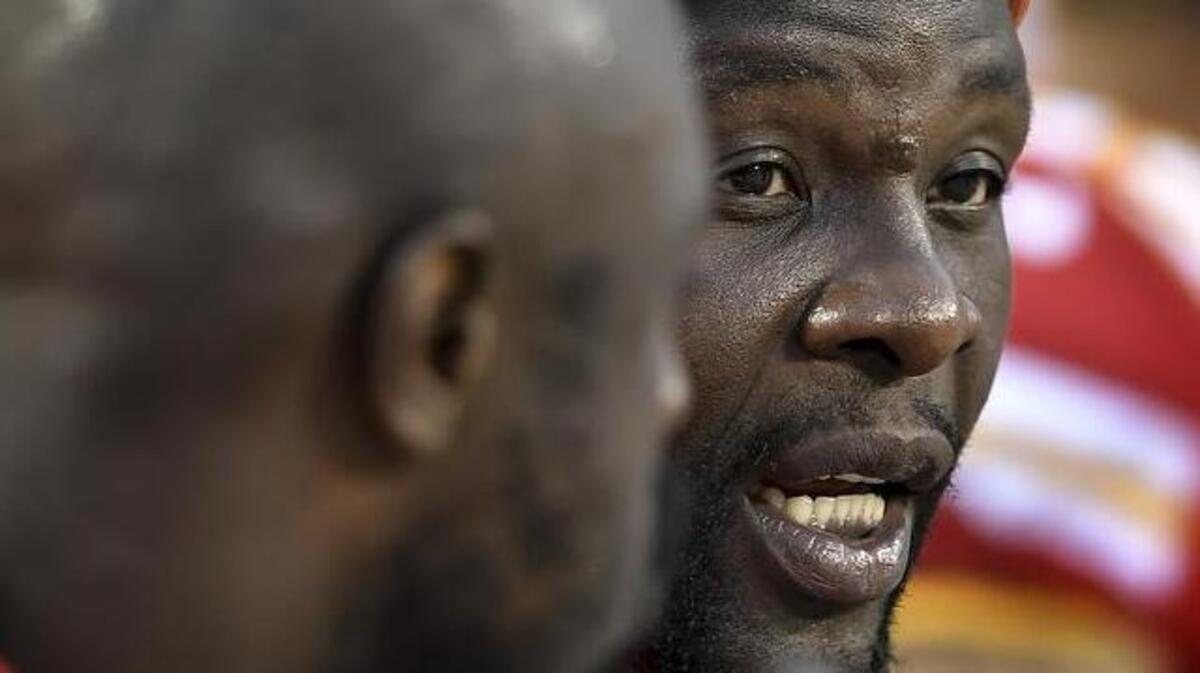 Kansas City Chiefs outside linebacker Tamba Hali (91) spoke with teammate Justin Houston on the team bench during NFL preseason action against the Tennessee Titans on August 31, 2017, at Arrowhead Stadium.