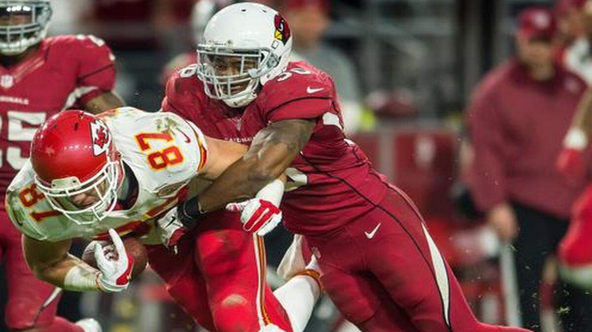 
Chiefs tight end Travis Kelce (87) committed a a critical turnover in the fourth quarter, when he was ruled to have fumbled as he was tackled by Arizona Cardinals strong safety Deone Bucannon (36). The play was reviewed, and the Cardinals were awarded the ball. The Cardinals went on to win the game 17-14.
