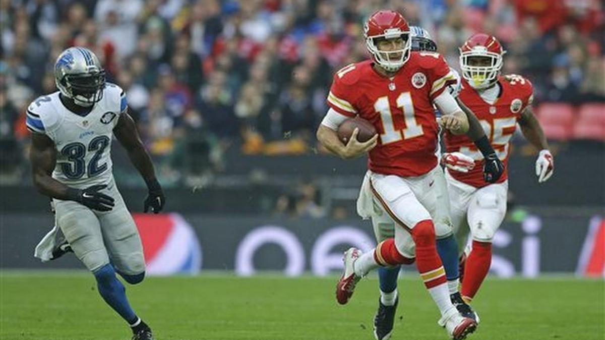 Kansas City Chiefs quarterback Alex Smith (11) runs with the ball during the NFL football game between Detroit Lions and Kansas City Chiefs Wembley Stadium in London, Sunday, Nov. 1, 2015.