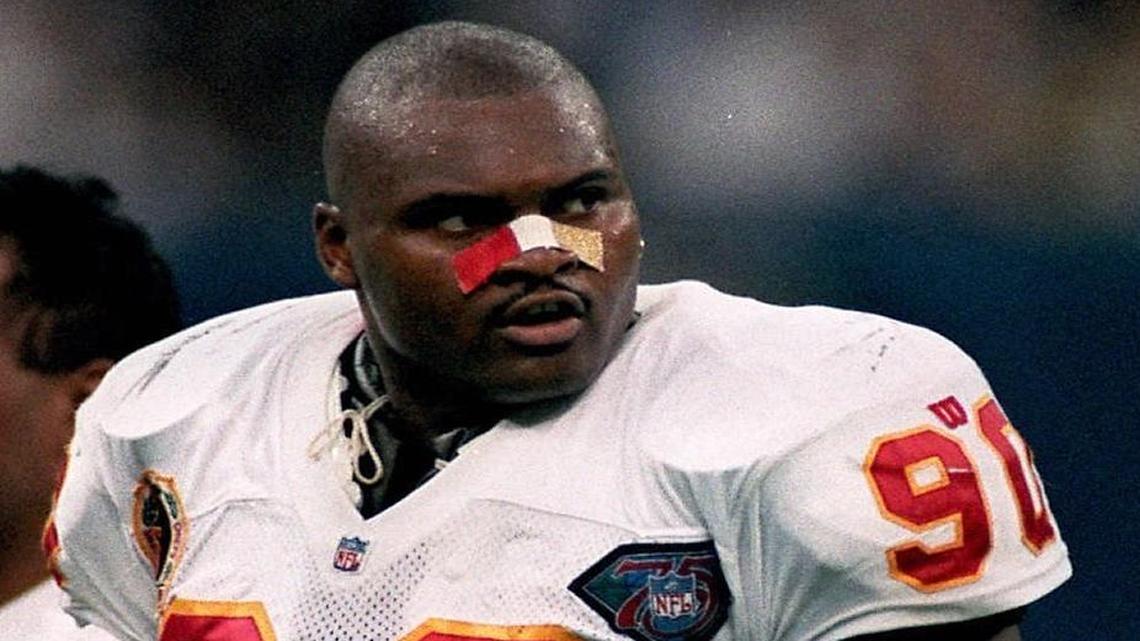 Neil Smith, pictured with the Chiefs in 1994, is in Miami this weekend to pull for his old team in the Super Bowl.
