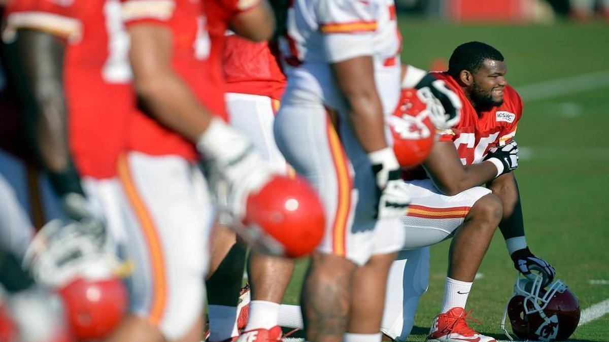 
Kansas City Chiefs tackle Tavon Rooks took a knee during NFL football training camp in St. Joseph.
