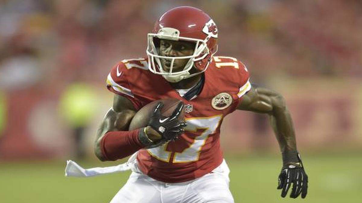 
Chiefs wide receiver Donnie Avery carries the ball against the Vikings during their Aug. 23 preseason football game at Arrowhead Stadium.
