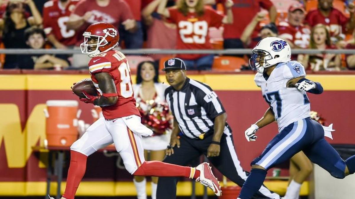 
Chiefs wide receiver Fred Williams (83) scores a touchdown ahead of Titans cornerback Cody Riggs (37) during their Aug. 28 preseason football game at Arrowhead Stadium.
