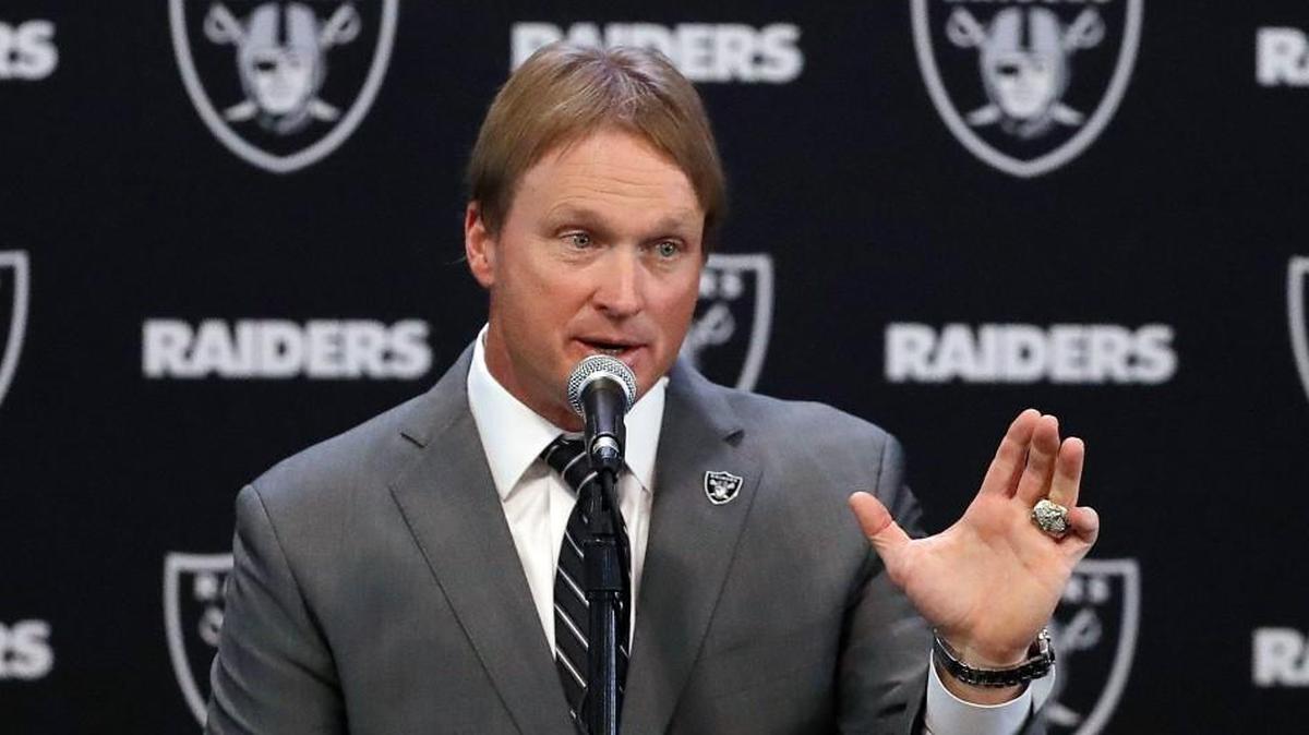Newly named Oakland Raiders head coach Jon Gruden answers questions during a Tuesday news conference.