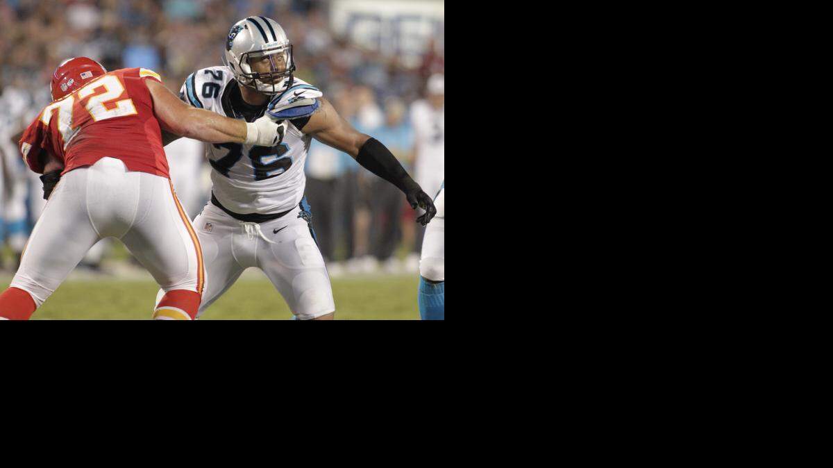 
Carolina Panthers' Greg Hardy (76) battles Kansas City Chiefs' Eric Fisher (72) during the first half of a preseason NFL football game in Charlotte, N.C., Sunday, Aug. 17, 2014.
