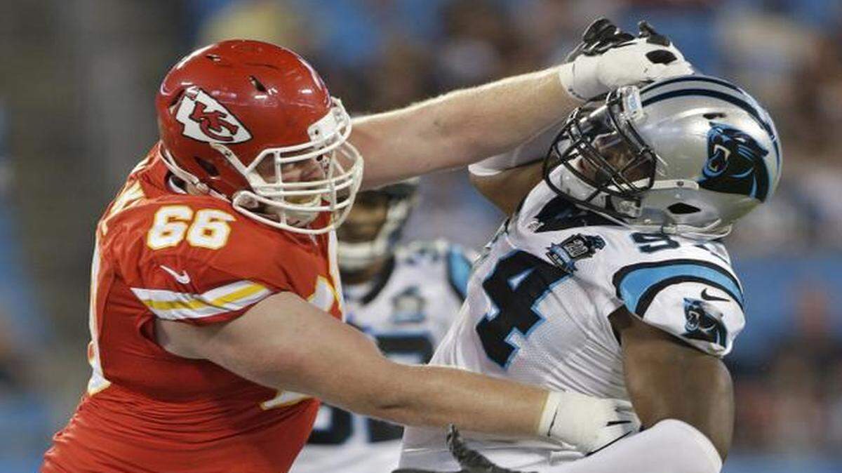
Ryan McKee (left) battled Carolina’s Kony Ealy during the second half of a preseason game on Aug. 17.
