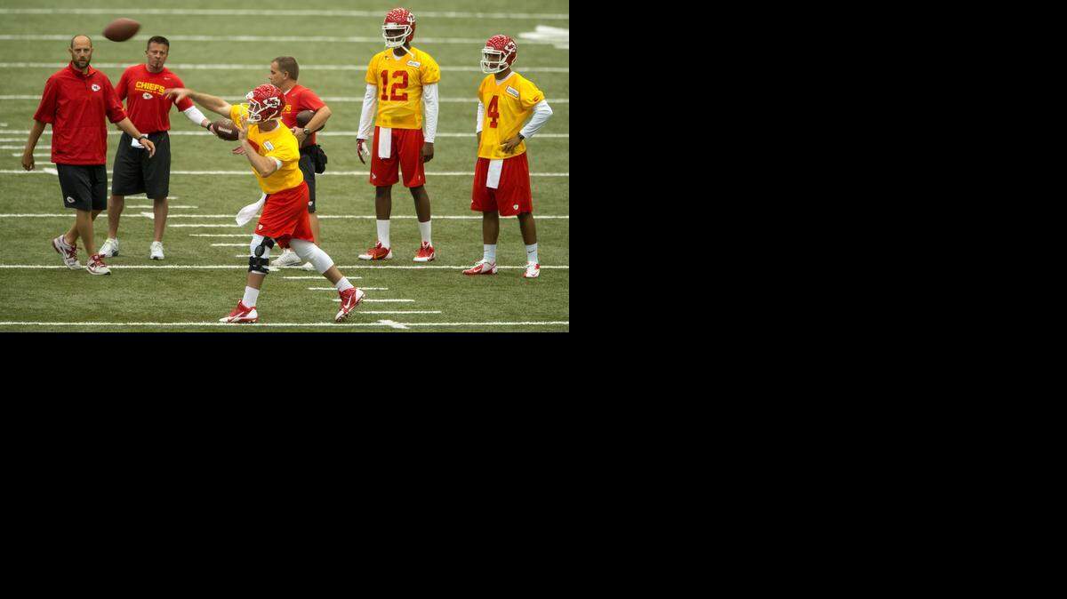 
Despite suffering a torn ACL in his right knee a little over six months ago, quarterback Aaron Murray (7), Kansas City’s fifth-round draft pick, was not limited in drills Saturday at the Chiefs’ rookie minicamp. Murray wore a large brace on the knee and took a number of snaps and made a number of throws during team and individual drills.


