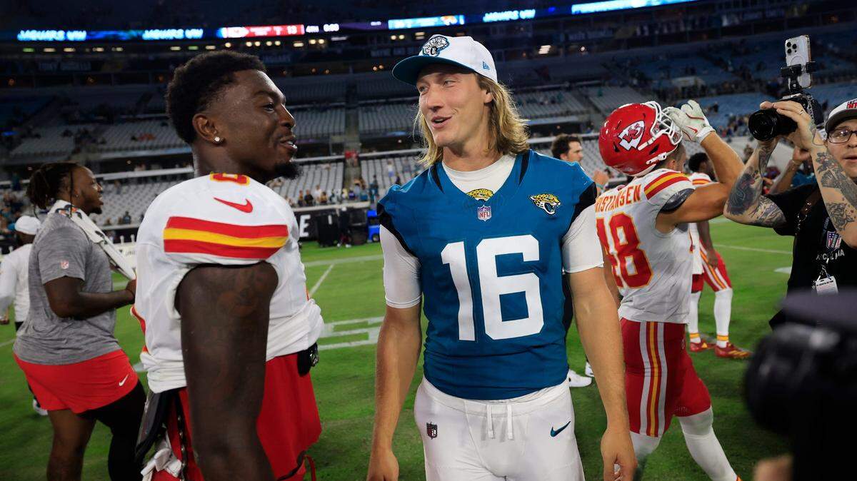 Jacksonville Jaguars quarterback Trevor Lawrence (16) talks with Kansas City Chiefs wide receiver Justyn Ross (8) after the game of a preseason NFL football game Saturday, Aug. 10, 2024 at EverBank Stadium in Jacksonville, Fla. The Jacksonville Jaguars defeated the Kansas City Chiefs, 26-13.