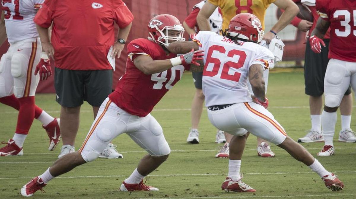 Chiefs fullback Trey Millard (left) worked against linebacker Andy Mulumba during a training camp drill Tuesday in St. Joseph.