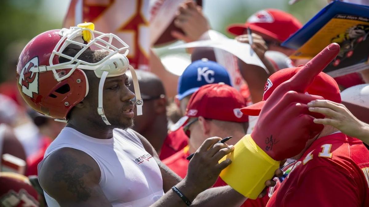 Chiefs safety Eric Berry and other players make it a point to stop and sign autographs for fans during their annual training camp workouts in St. Joe.