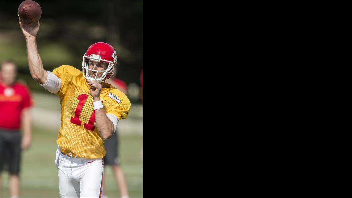 
Kansas City Chiefs quarterback Alex Smith (11) threw a pass on Monday morning during Kansas City Chiefs summer training camp practice at Missouri Western State University in St. Joseph, Mo.
