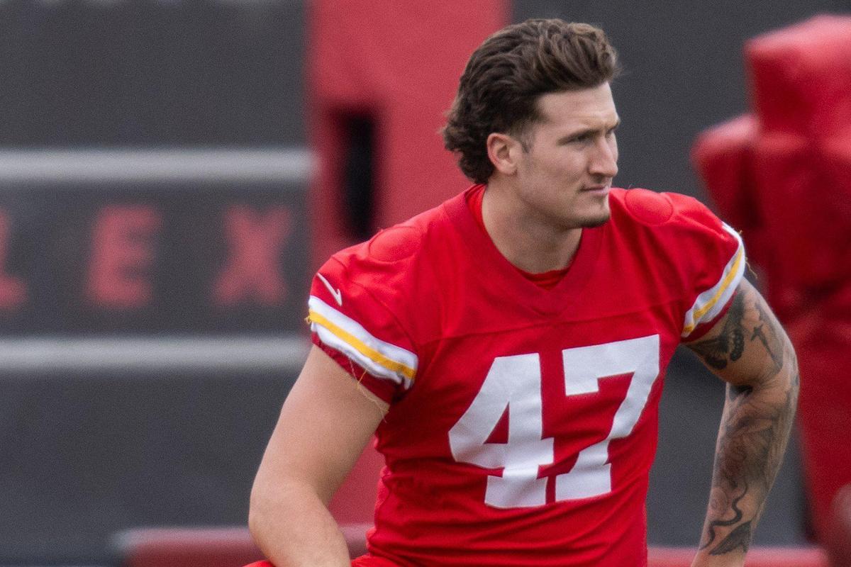 Kansas City Chiefs tight end Baylor Cupp stretches during Chiefs practice on Tuesday, Nov. 26, 2024.