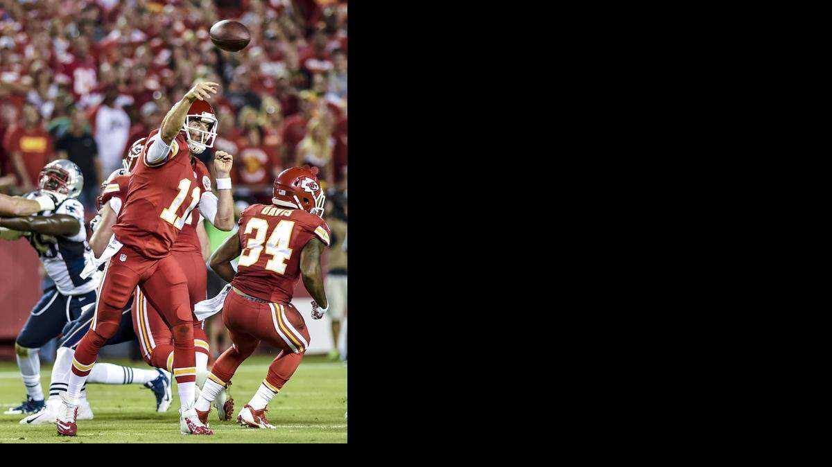 
Kansas City Chiefs quarterback Alex Smith (11) throws the ball during the NFL game against the New England Patriots on Monday, Sept. 29, at Arrowhead Stadium in Kansas City. The Chiefs won 41-14.
