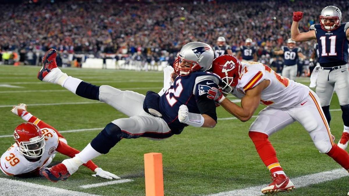 Kansas City Chiefs cornerback Tyvon Branch (right) and free safety Husain Abdullah (left) stopped New England Patriots quarterback Tom Brady short of the end zone in the second quarter.