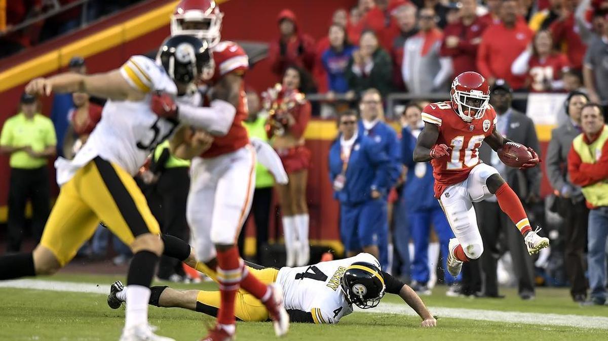 Kansas City Chiefs wide receiver Tyreek Hill (10) leapt over Pittsburgh Steelers punter Jordan Berry (4) on the final Chiefs possession but was concussed on the tackle on October 15, 2017 at Arrowhead Stadium in Kansas City.