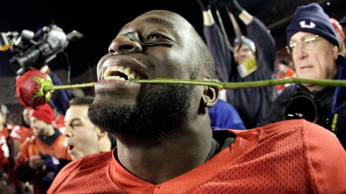 Jay Valai, celebrating a Wisconsin win over Northwestern in 2010, has been hired as a defensive quality control coach by Andy Reid and the Chiefs.