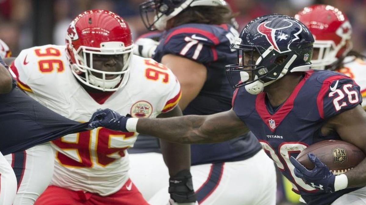 Kansas City Chiefs defensive end Jaye Howard closed in on Houston Texans running back Lamar Miller during a game last season.