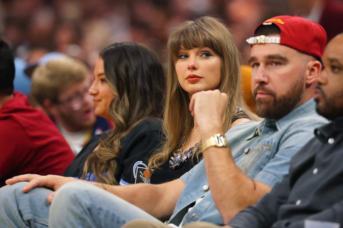 Singer Taylor Swift and Travis Kelce of the Kansas City Chiefs attend Game Three between the New York Knicks and the Cleveland Cavaliers in the NBA Eastern Conference Finals at Rocket Arena on May 23, 2026 in Cleveland, Ohio.