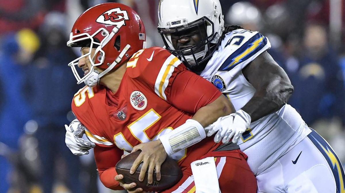 Kansas City Chiefs quarterback Patrick Mahomes is sacked by Los Angeles Chargers defensive end Melvin Ingram late in the second quarter of Thursday’s football game on December 13, 2018 at Arrowhead Stadium in Kansas City, Mo.