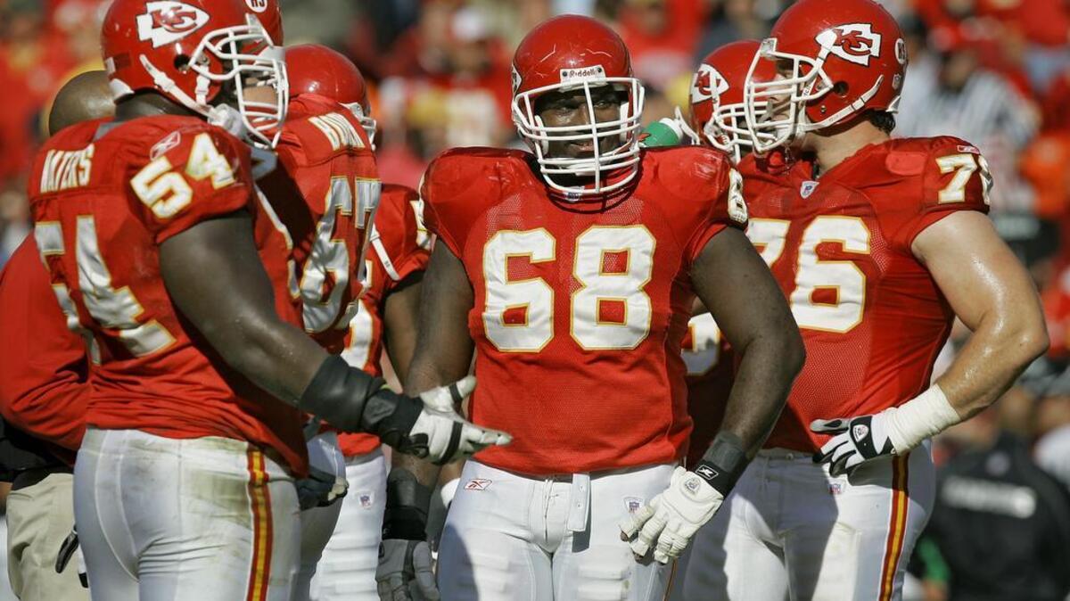 
FILE: 11062005--CHIEFS RAIDERS--Kansas City Chiefs' Will Shields, 68, found a moment to smile during a timeout against the Oakland Raiders Sunday afternoon at Arrowhead Stadium. 
