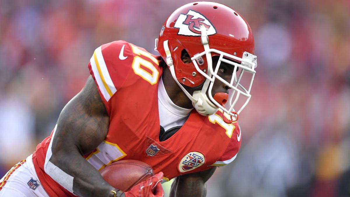 Kansas City Chiefs' Tyreek Hill returns a punt during Saturday's playoff football game against the Tennessee Titans on January 6, 2018 at Arrowhead Stadium in Kansas City, Mo.