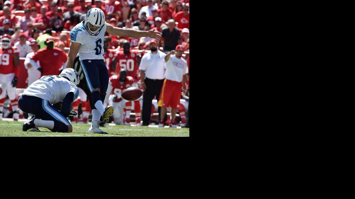 
Tennessee Titans kicker Ryan Succop (8) completes a field goal with 3 seconds left in the second half during Sunday's football game against the Kansas City Chiefs at Arrowhead Stadium.

