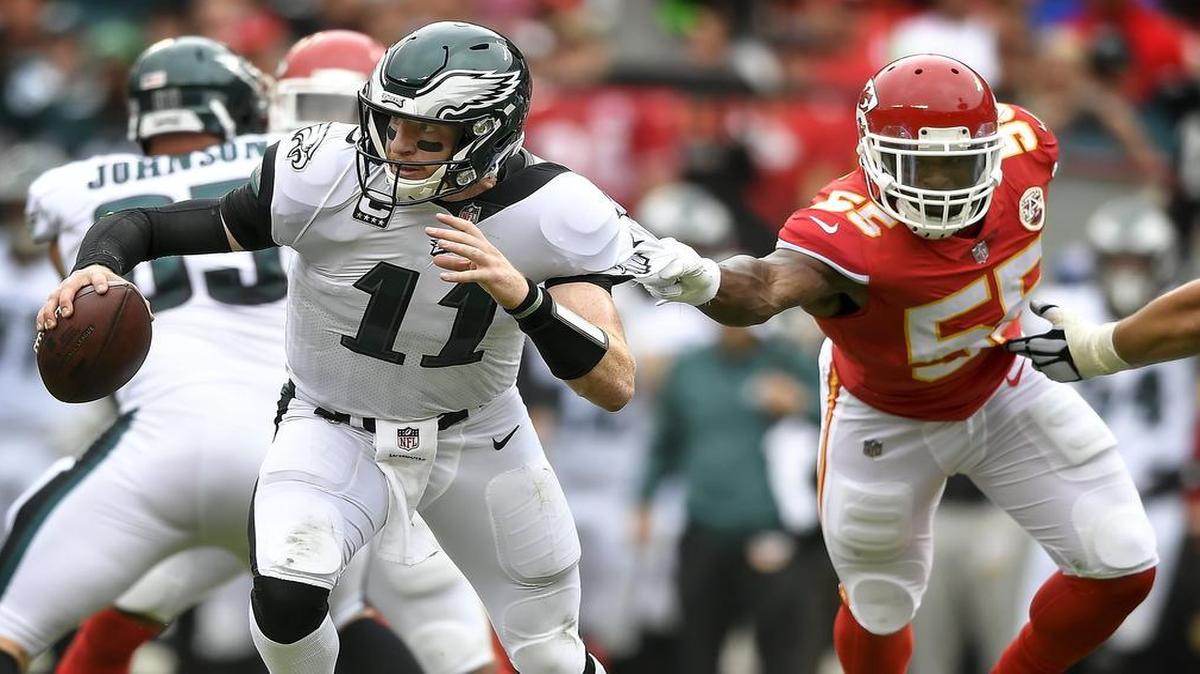 Philadelphia Eagles quarterback Carson Wentz was sacked by Kansas City Chiefs outside linebacker Dee Ford in the second quarter on September 17, 2017, at Arrowhead Stadium in Kansas City, Mo.