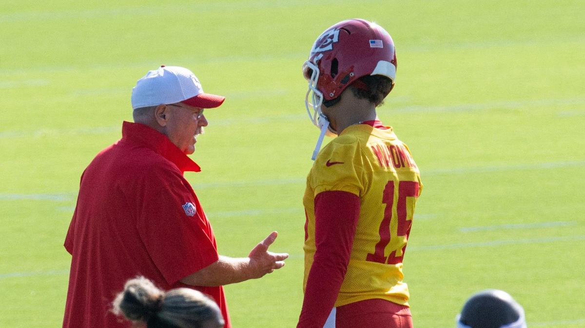 Kansas City Chiefs quarterback Patrick Mahomes (15) talks with coach Andy Reid during Chiefs training camp on Thursday, July 18, 2024, in St. Joseph.