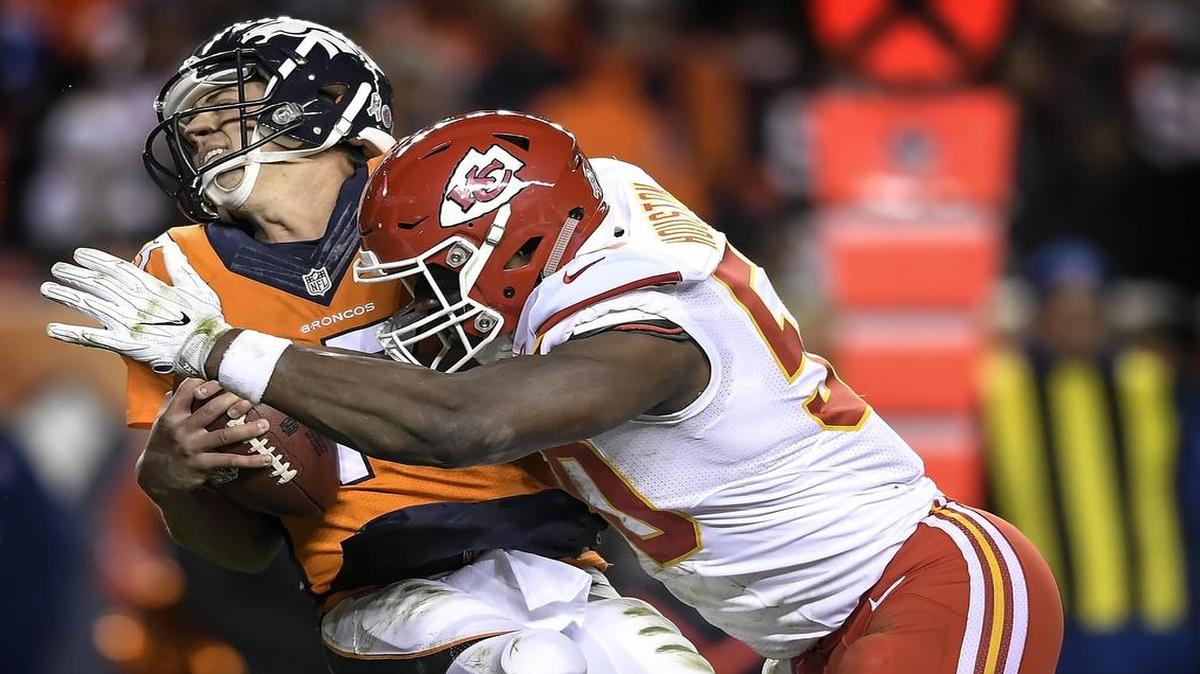 Kansas City Chiefs outside linebacker Justin Houston tackled Denver Broncos quarterback Trevor Siemian in the end zone, leading to a safety, in the second quarter on November 27, 2016, at Sports Authority Field at Mile High in Denver.