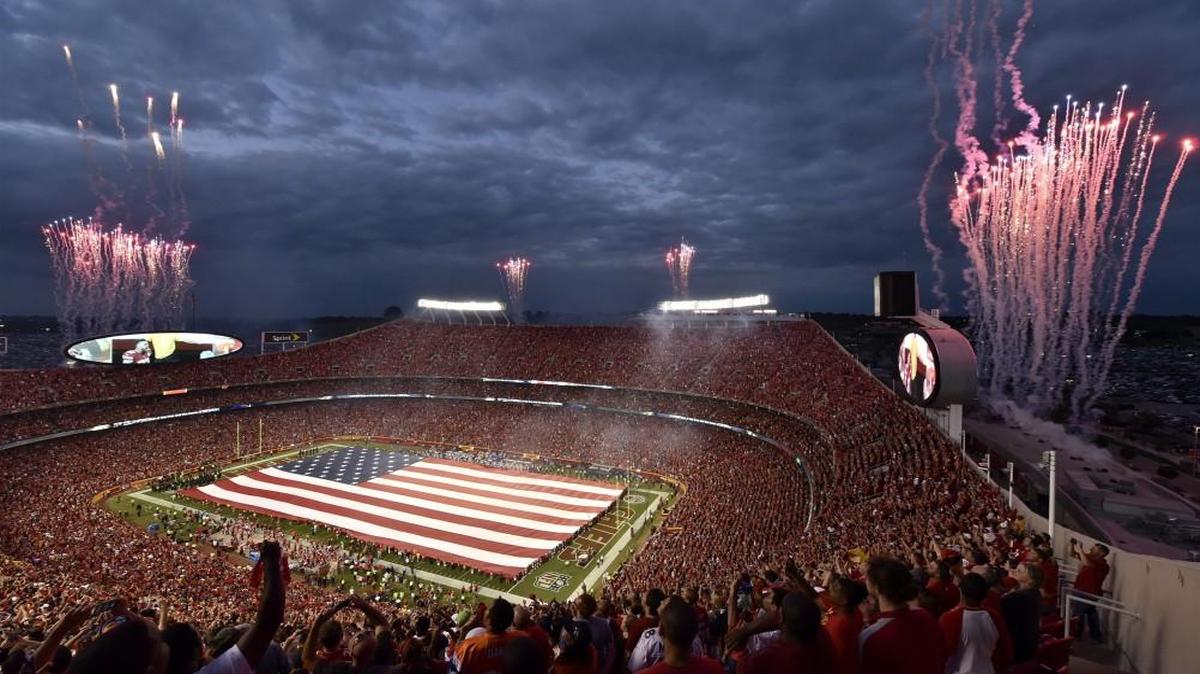 Fireworks lit the sky and fans cheered as a full-field U.S. flag was unfurled during pregame ceremonies at the Kansas City Chiefs and Denver Broncos football game at Arrowhead Stadium last September.