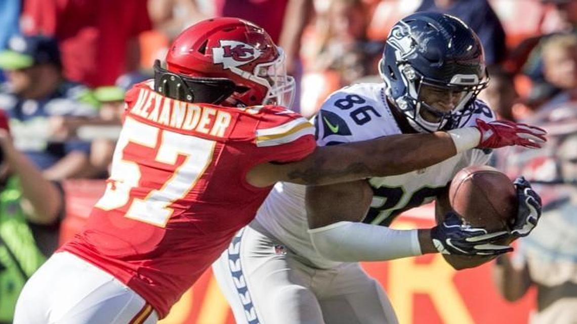 Kansas City Chiefs linebacker D.J. Alexander (left).