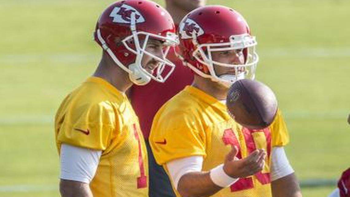 
Chiefs quarterback Alex Smith (left) said he and Chase Daniel (right) benefit from working with the rookies before the full training camp opens.
