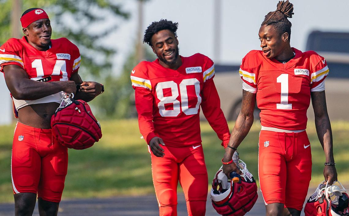 Chiefs wide receivers Cornell Powell (14), Montrell Washington (80) and Xavier Worthy (1) walk to the field for training camp at Missouri Western State University on Thursday, Aug. 1, 2024, in St. Joseph.