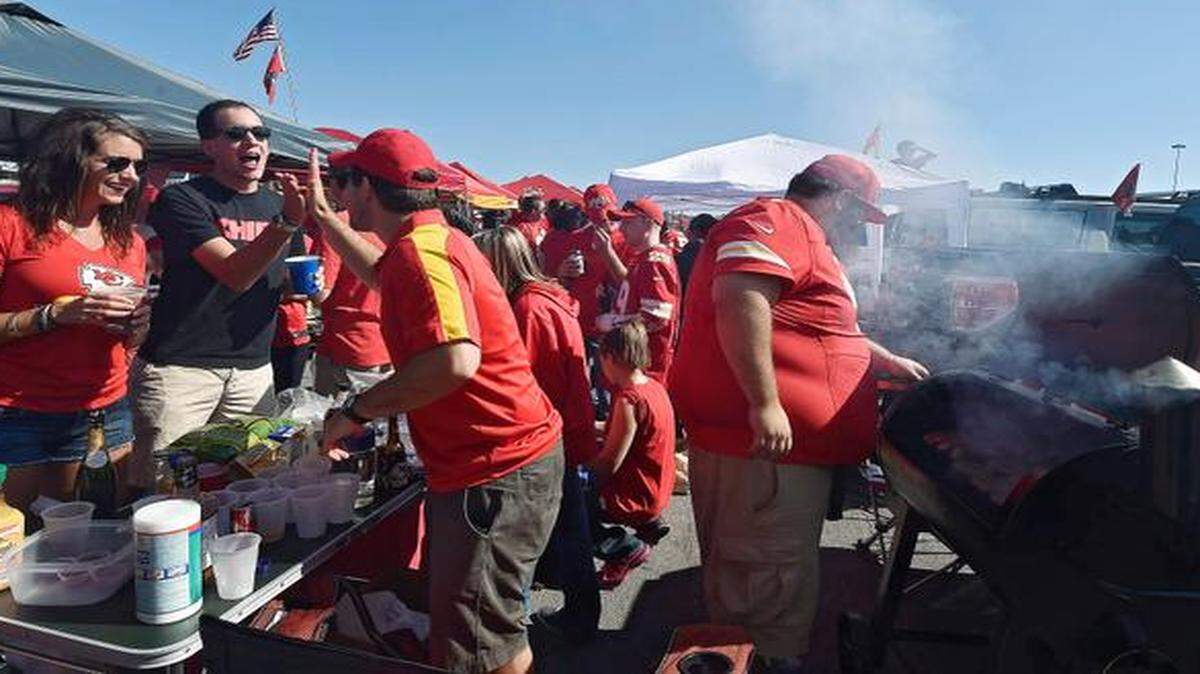 
Fans tailgate before Sunday's football game between the Kansas City Chiefs and Tennessee Titans at Arrowhead Stadium.
