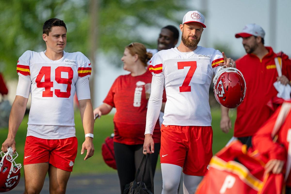 Chiefs punter Matt Araiza (49) and kicker Harrison Butker (7) walk to the field for training camp at Missouri Western State University on Wednesday, July 24, 2024, in St. Joseph.