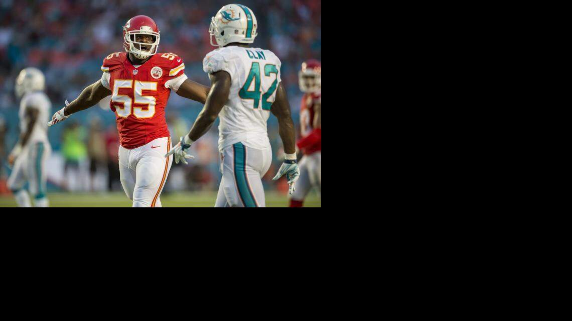 
Kansas City Chiefs linebacker Dee Ford (left) made the motion of incomplete pass on a near sack he made on Miami Dolphins quarterback Ryan Tannehill in the fourth quarter at Sun Life Stadium in Miami Gardens, Fla. on Sunday.
