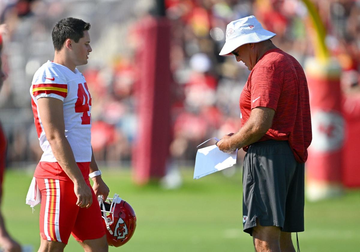 Chiefs punter Matt Araiza (49) stands next to Dave Toub, special teams coach, during training camp at Missouri Western State University on Monday, Aug. 5, 2024, in St. Joseph.