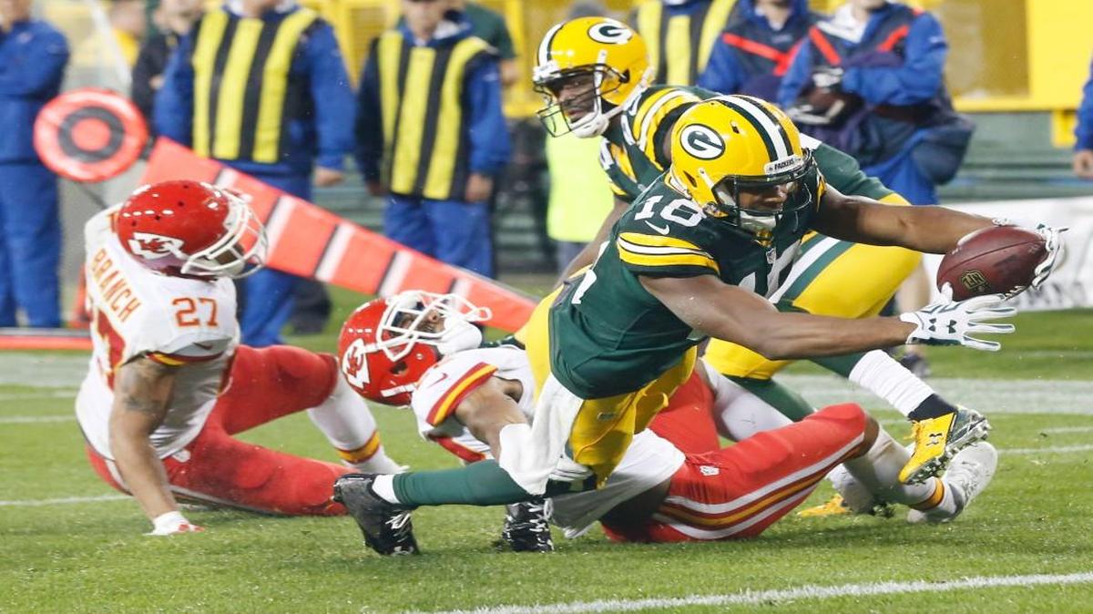 
Green Bay’s Randall Cobb dives into the end zone for one of three touchdowns against the Chiefs Monday night.
