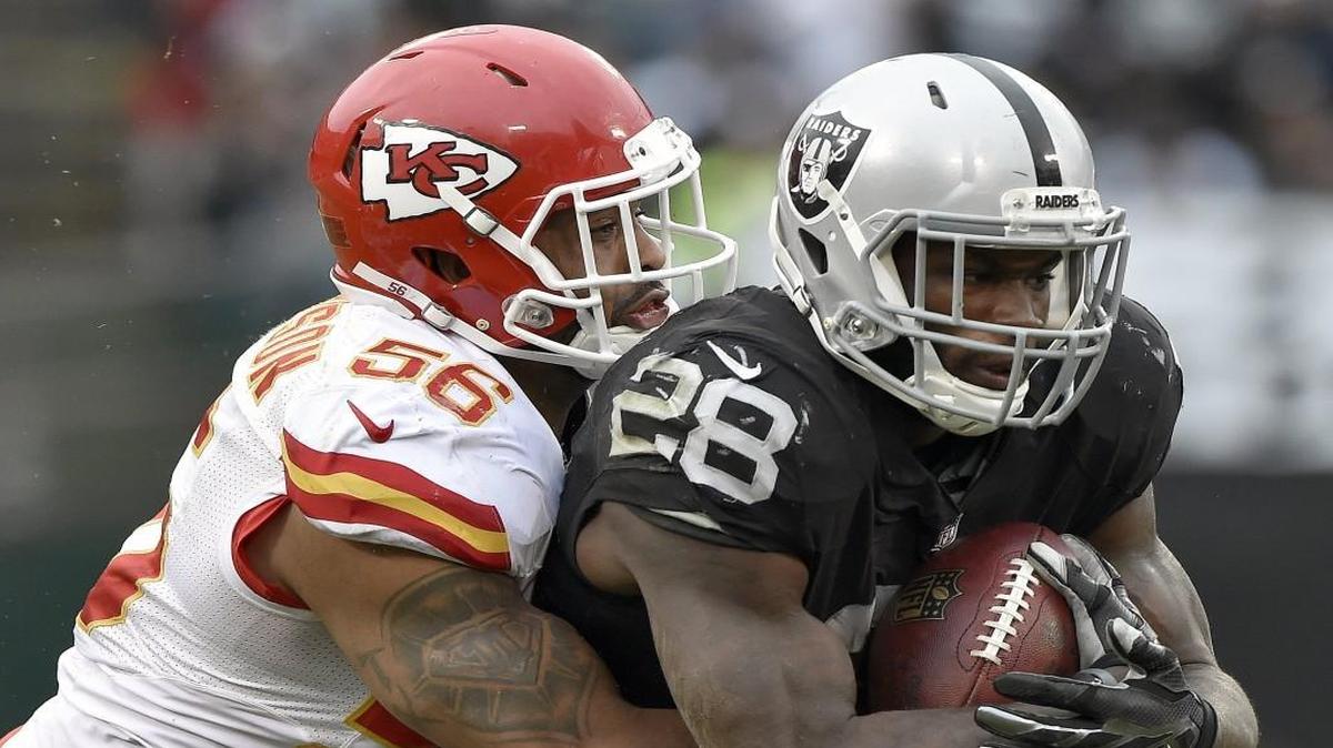 Chiefs inside linebacker Derrick Johnson (left) has turned back the clock this year, especially since the midpoint of the season.